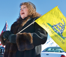Forest Service protestor with Gadsden flag