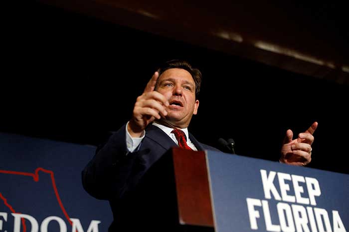 Florida Governor Ron DeSantis at podium