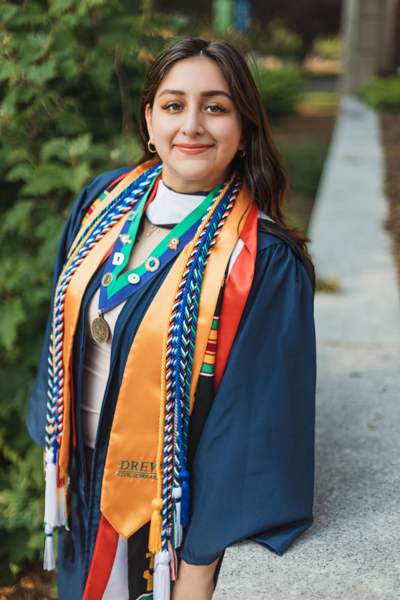 a student in graduation apparel