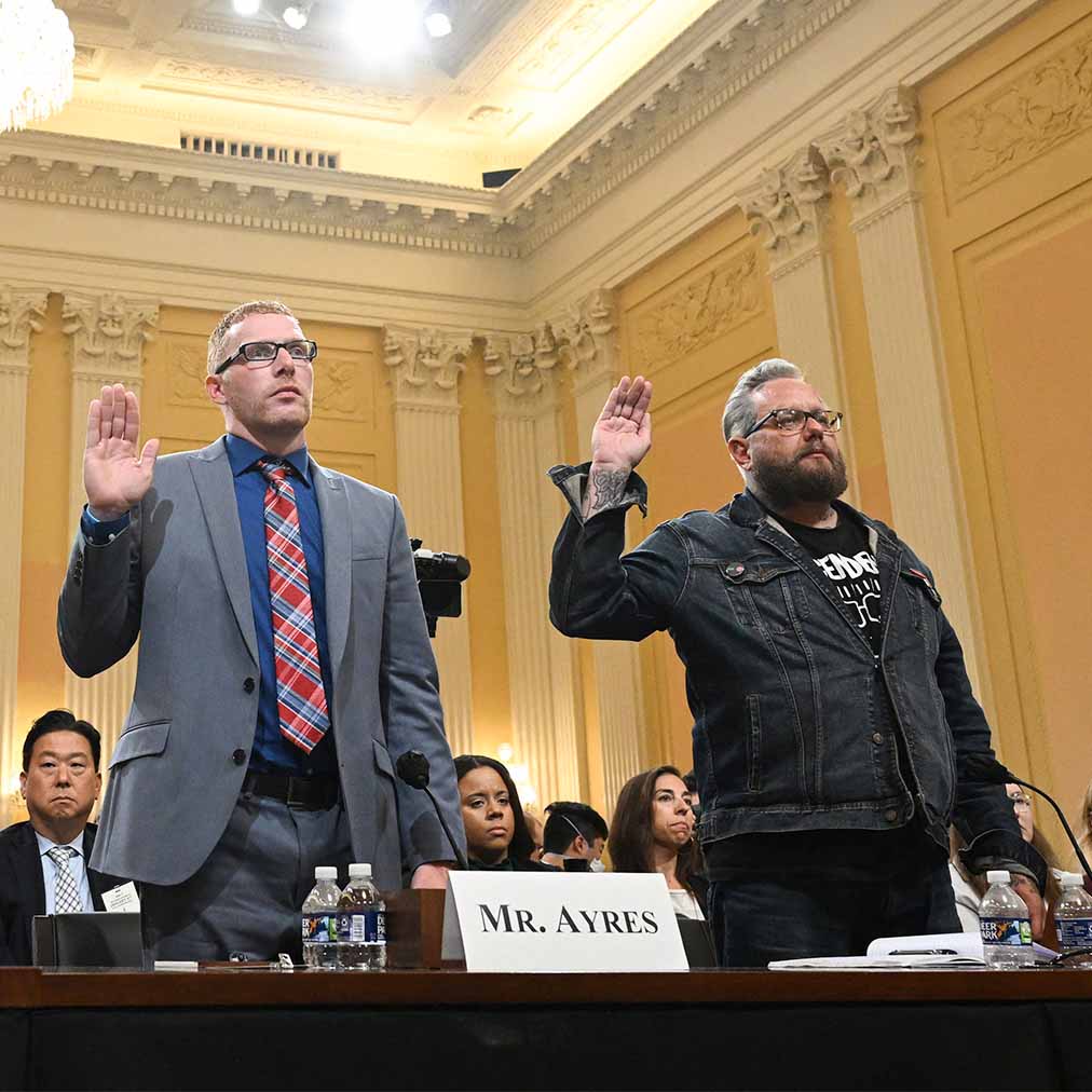 January 6 Committee witnesses raise hands during swearing in January 6 Committee witnesses raise hands during swearing in