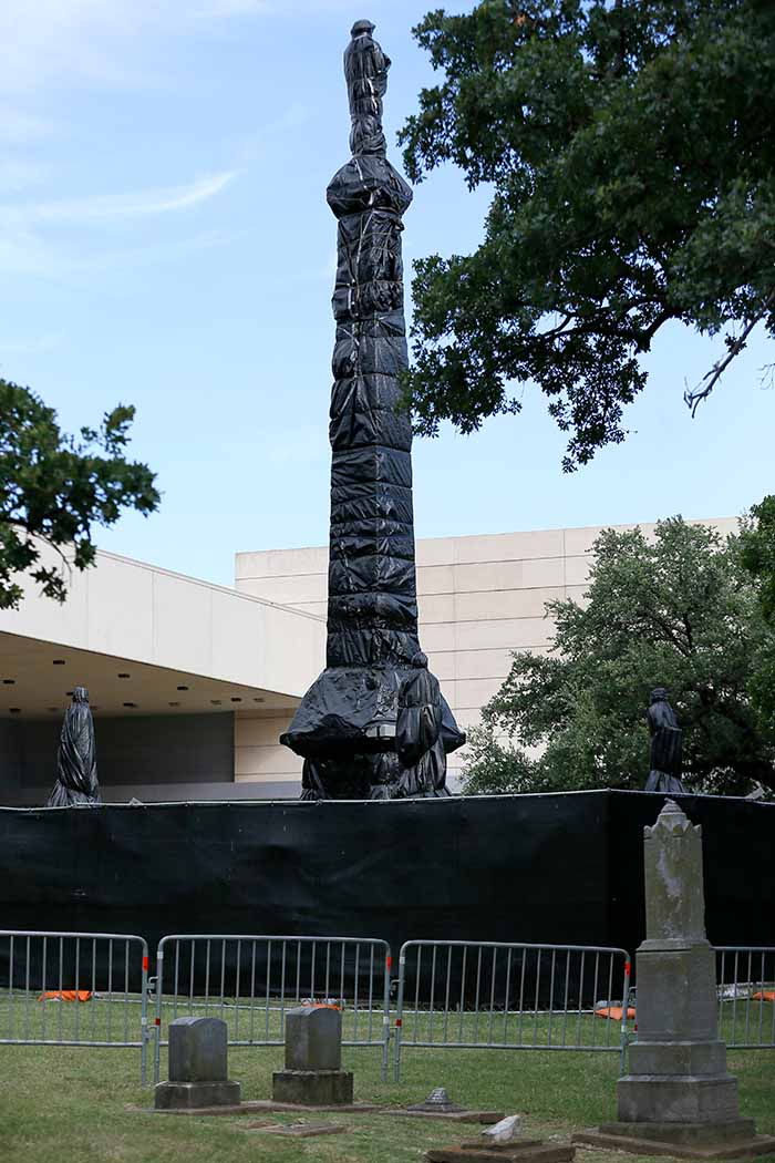 The Dallas Confederate War Memorial statue in Dallas, Texas, is prepared for removal