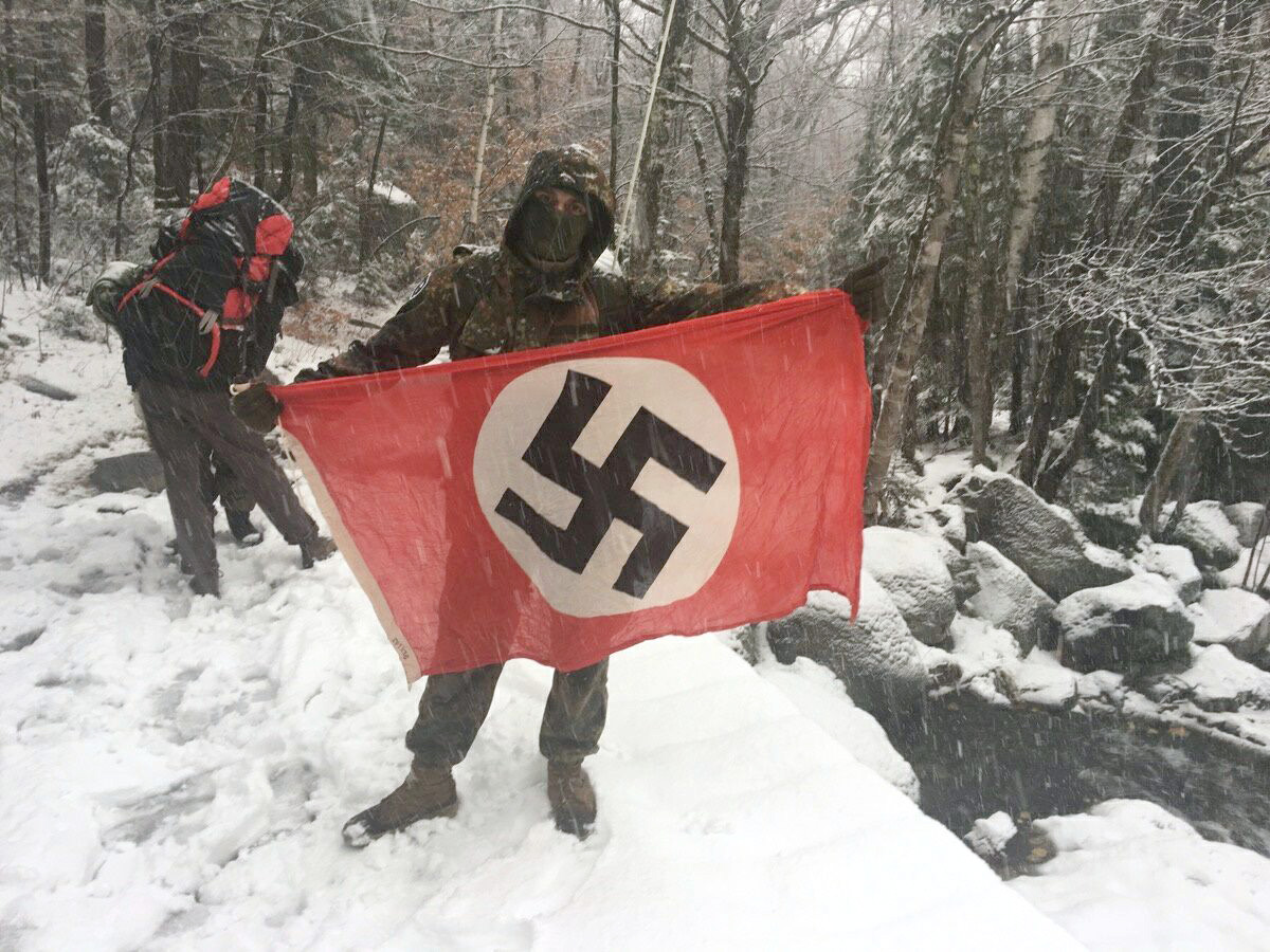 A photo of Atomwaffen Division members posted on Iron March