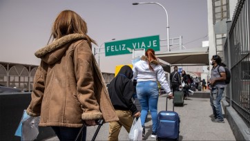 Migrants at a border crossing