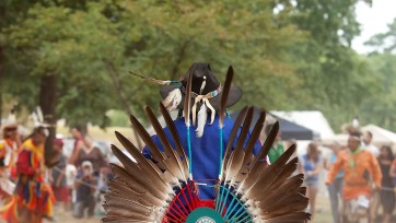 Native American person in ceremonial attire