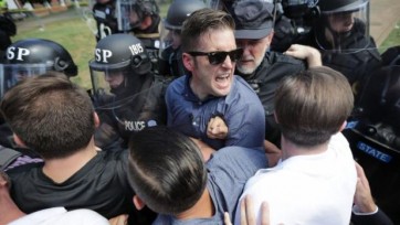 Richard Spencer retreats from Charlottesville's Unite the Right rally on August 12. 