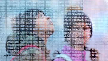 Children seen through glass wall of numbers 