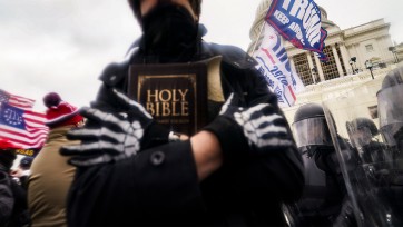 Capitol Trump supporter with bible