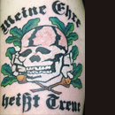 Skinhead meaning crucified tattoo Frequently Asked