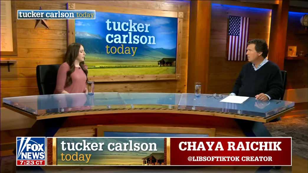 Tucker Carlson interviewing Chrya Raichik on set.