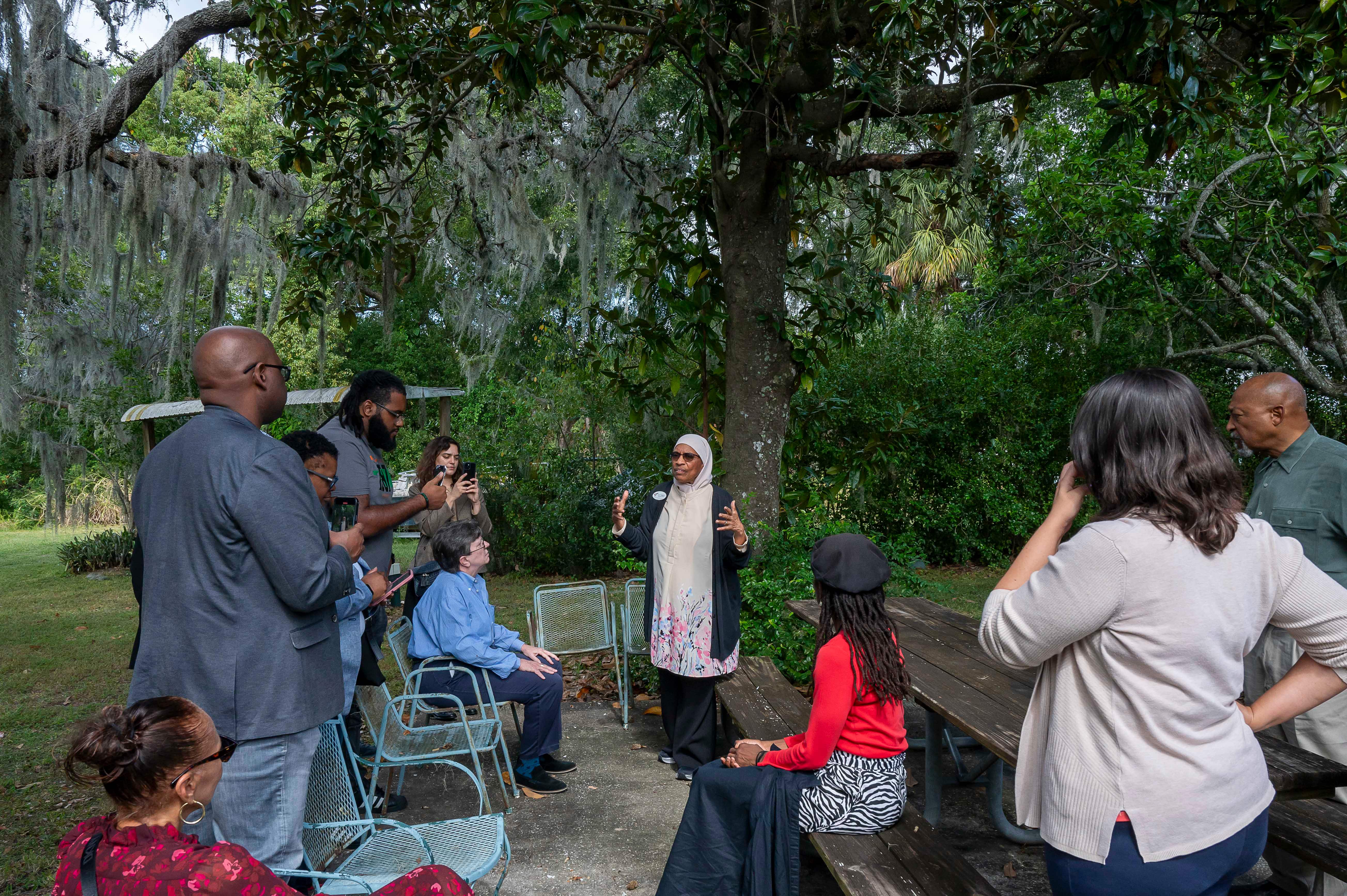 eatonville-florida-historic-preservation People gather in an outdoor space.