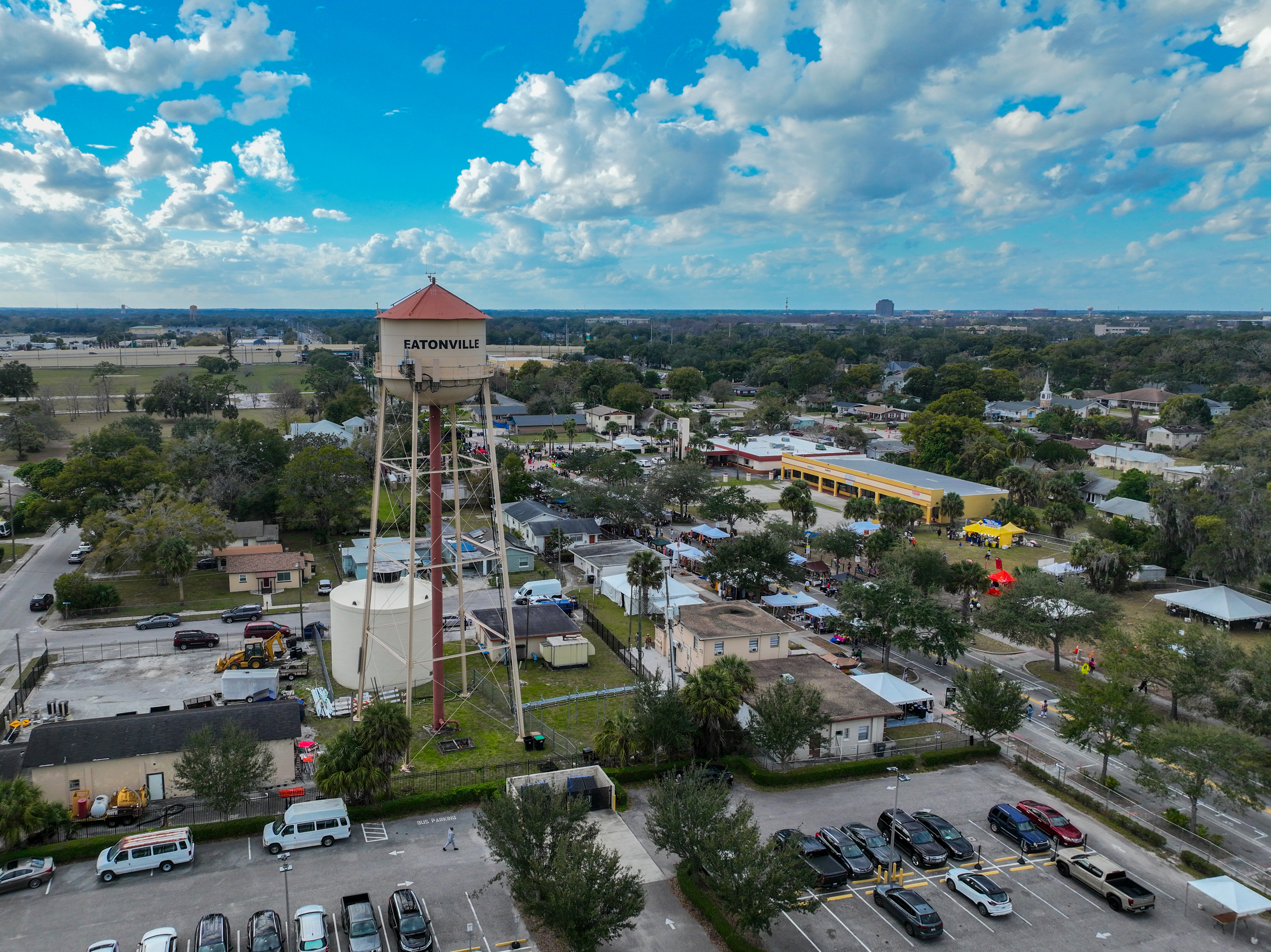 Panoramic view of town of Eatonville, Florida with water tower in background.