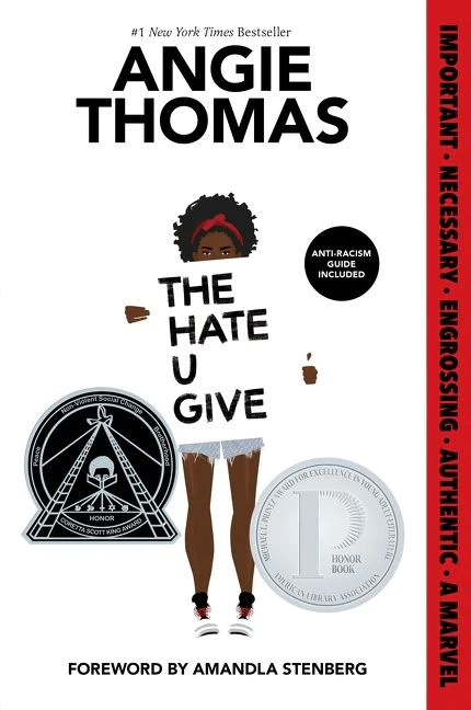 Book cover of person holding sign with title The Hate U Give