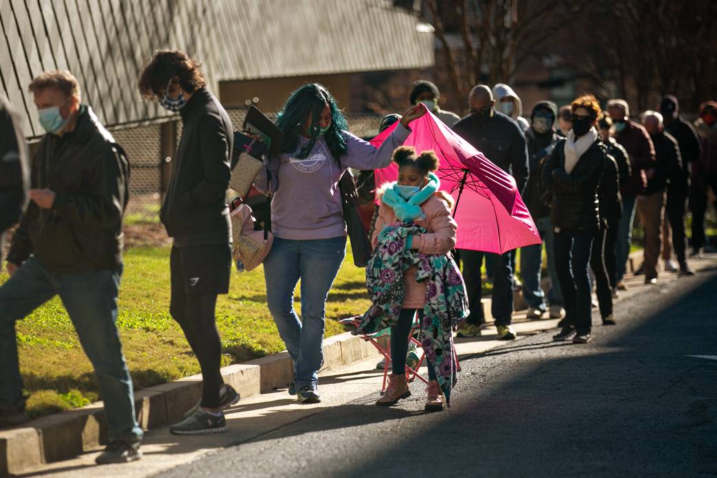 Georgia voters wait in a long line to vote