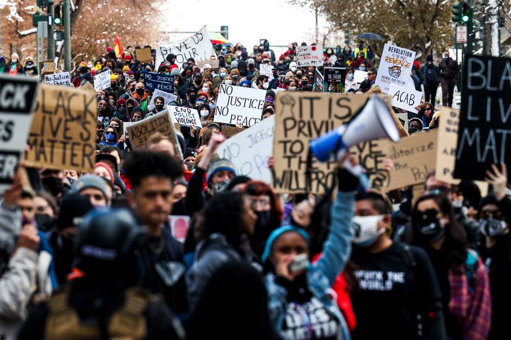 People march near the Colorado State Capitol 