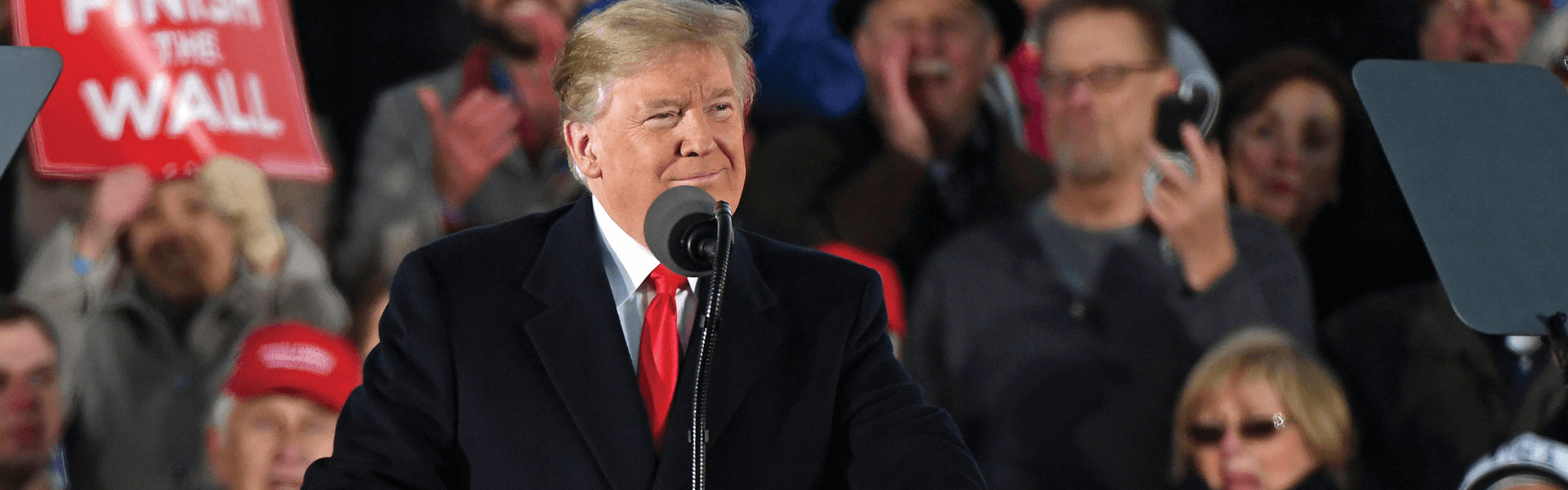 ir166_yih_rage-against-change_trump-rally-finish-wall-sign_ap_18330850361217