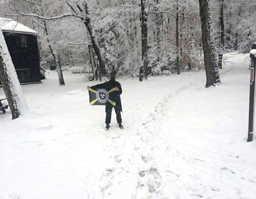 A photo of an Atomwaffen Division member posted on Iron March