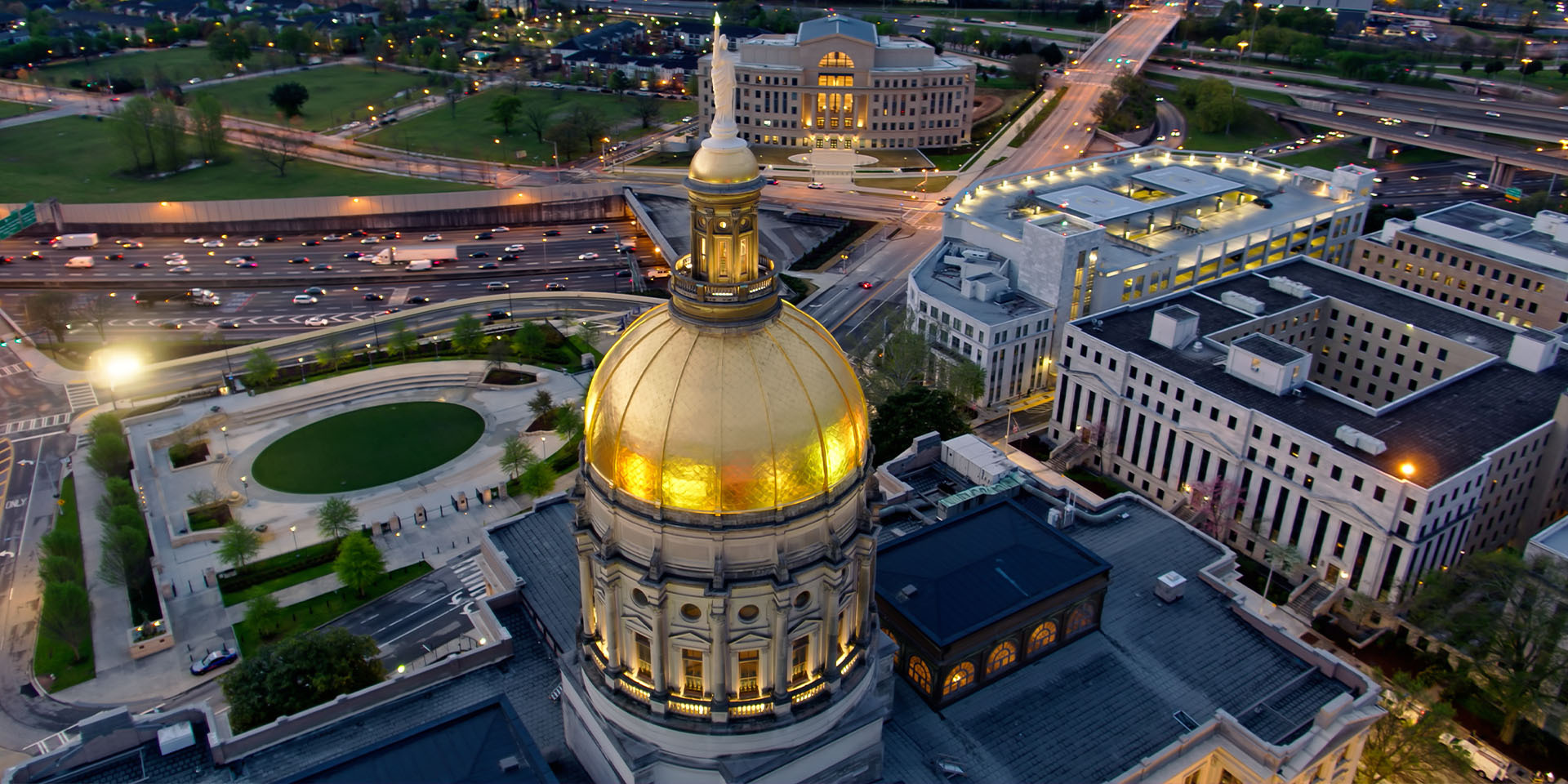picture of a government building with a round, gold roof