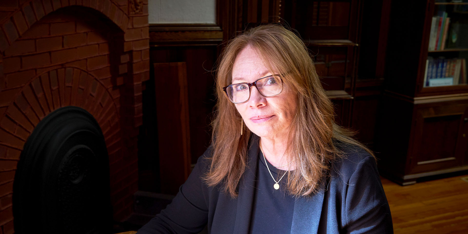 Portrait of person in interior setting.