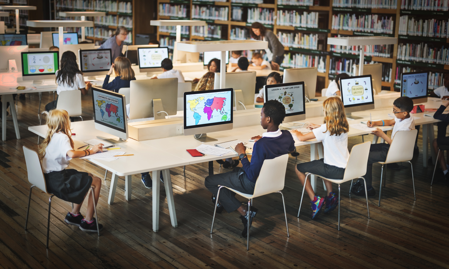 students in media center library