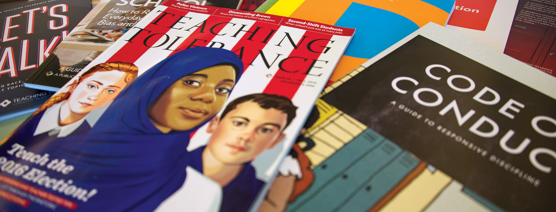 Photo depicts a pile of colorful Teaching Tolerance resources.