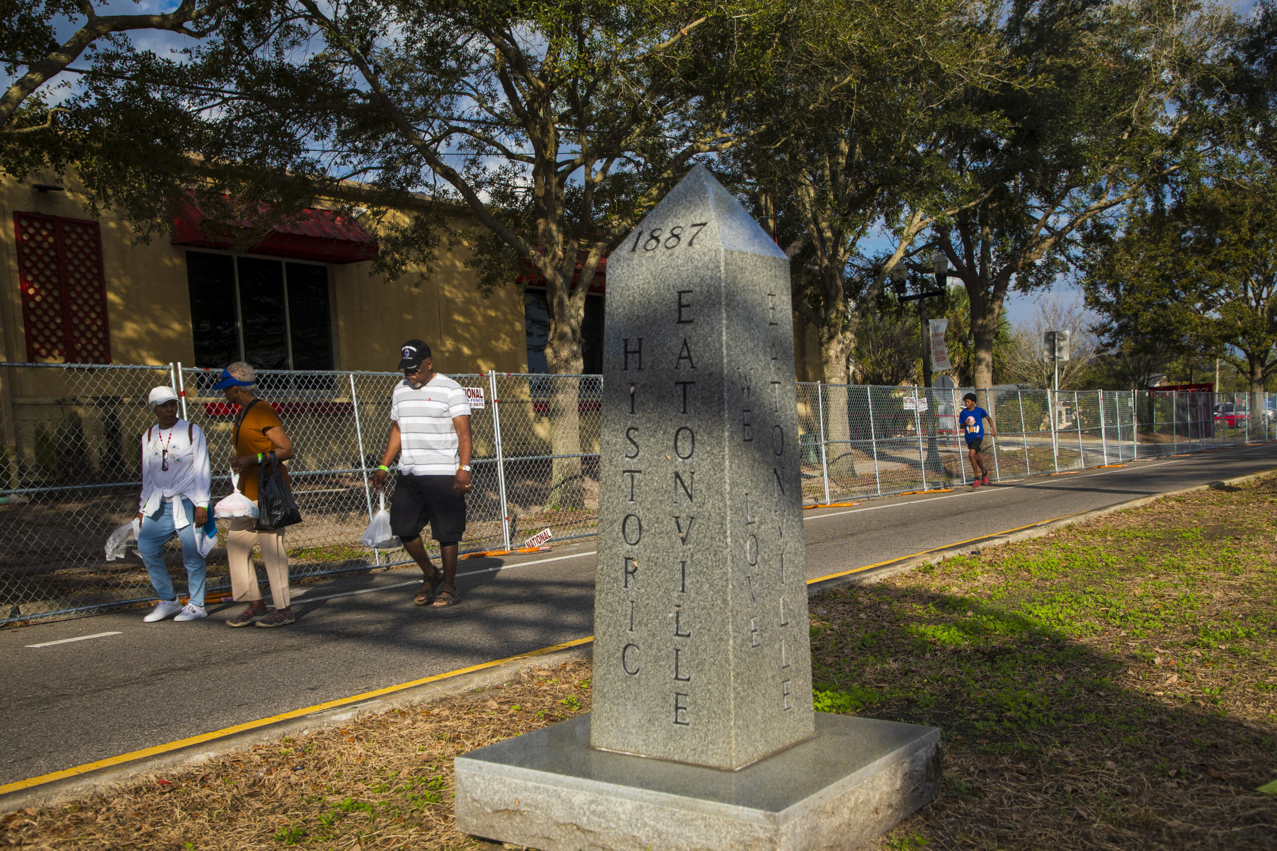 A stone obelisk engraved with the words “1857 Historic Eatonville”