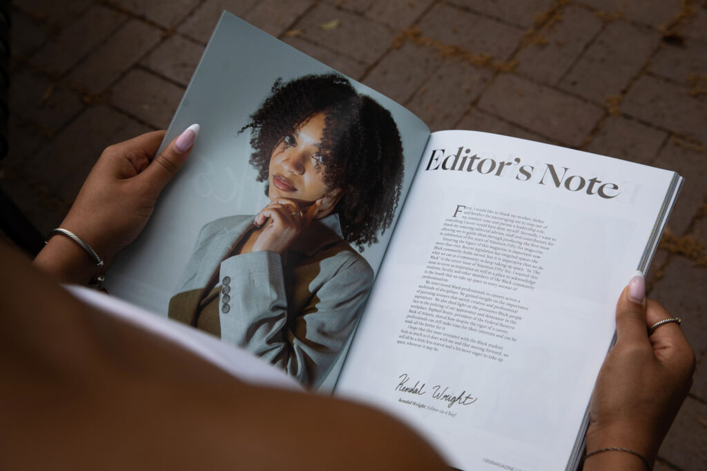A magazine with a headshot and an article entitled "Editor's Note"